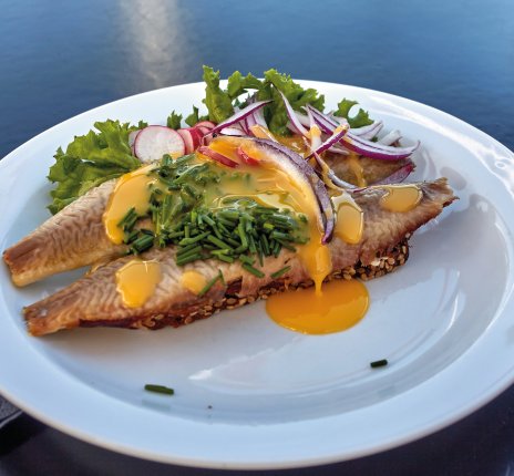 "Sonne über Gudhjem" &copy; PatPat - stock.adobe.com